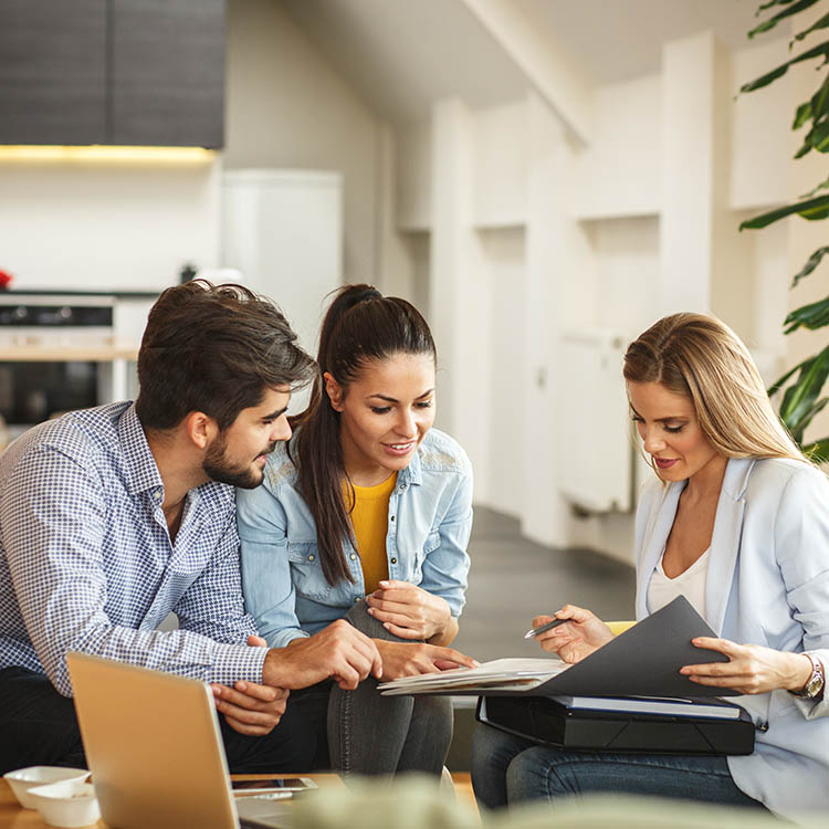 Female Real Estate agent offers home ownership and life insurance